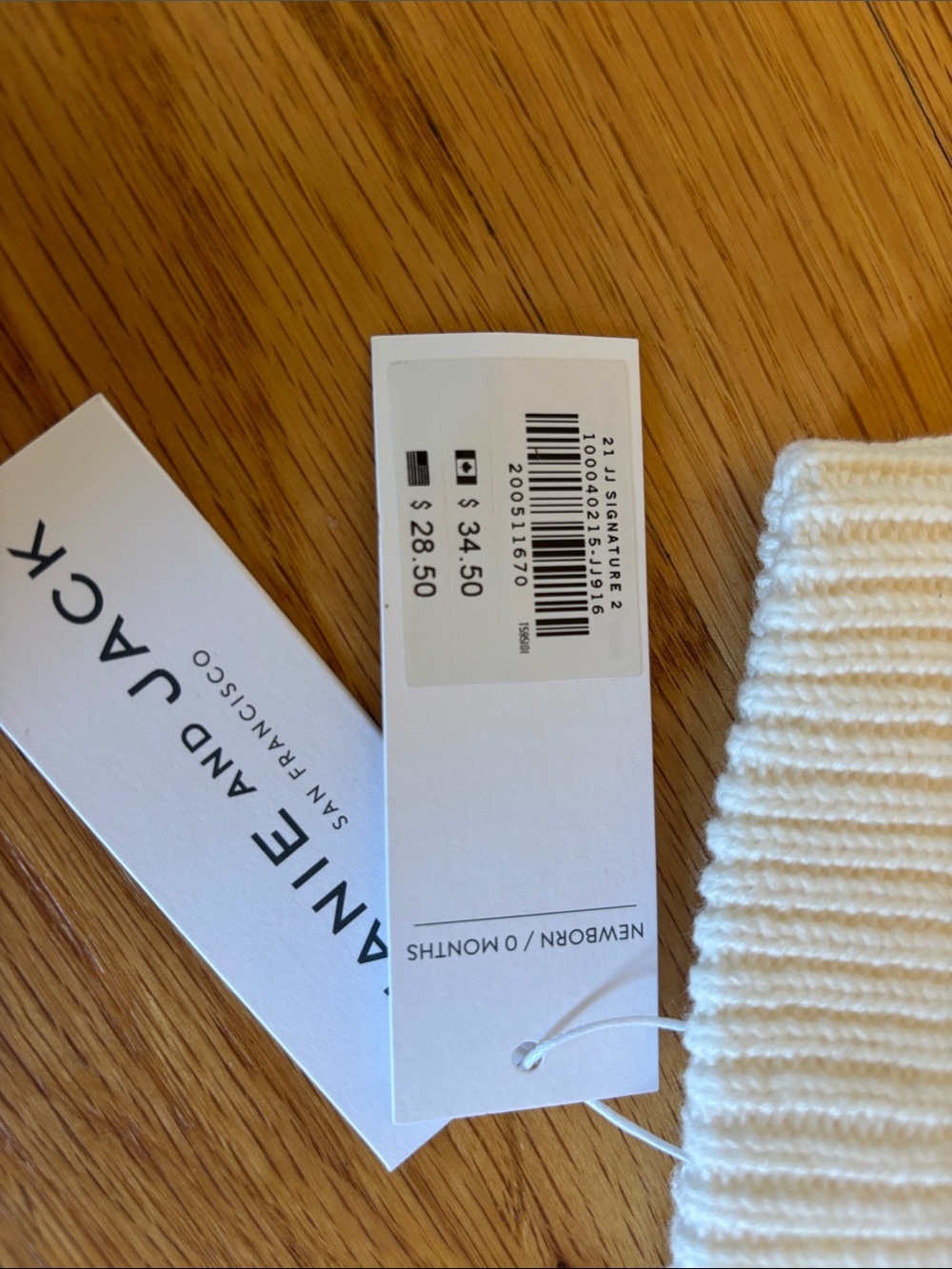 Janie and Jack NB Cream Cable Knit Pom Hat - Picture 3 of 3